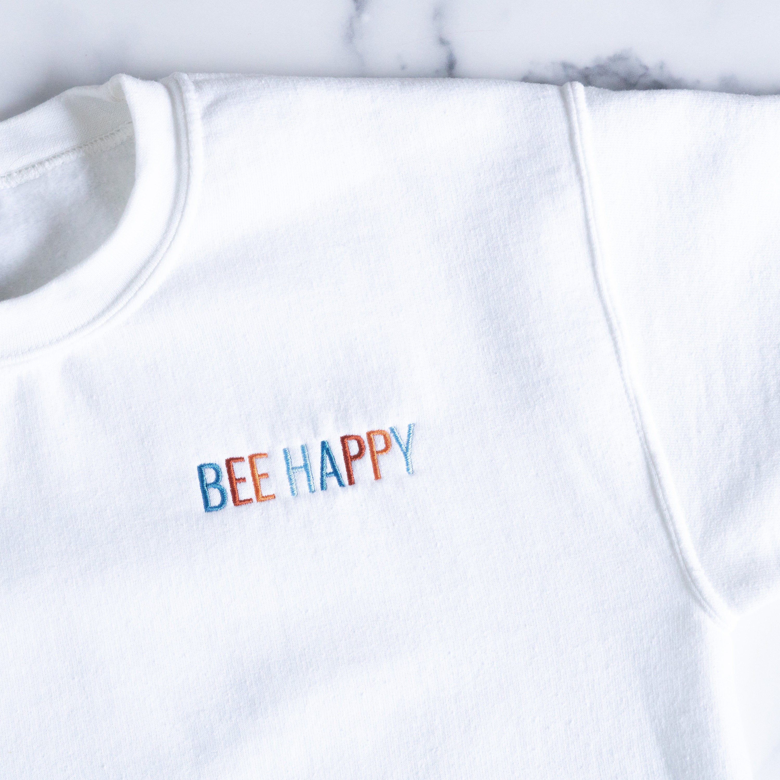 Embroidered bee sweatshirt hot sale